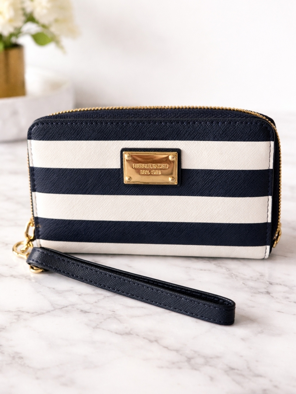 Michael Kors Navy and White Striped WristletHenri Bendel West 57th Stripe